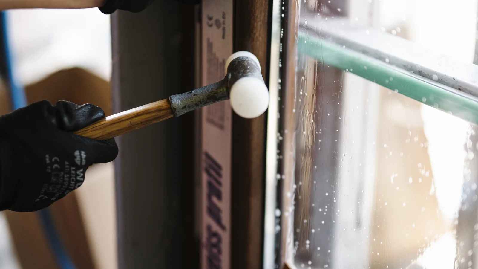 Window frame being assembled in a fabrication workshop
